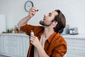 Person supporting physical comfort with CBD and CBG wellness
